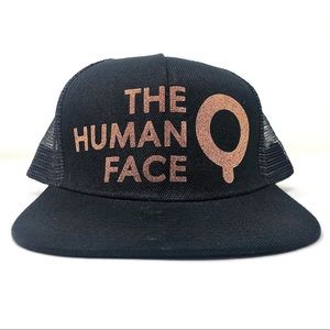 “The HUMAN Face” trucker hat by HUMAN
